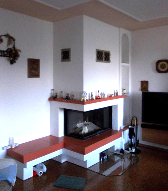 Künstlerofen roter Ablage und Sitzbank